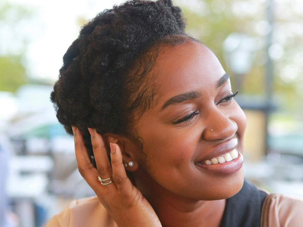 black woman in a protective natural hair style